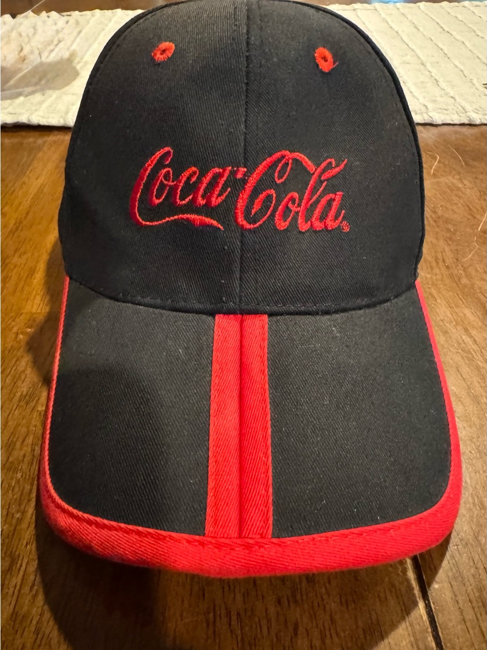 Vintage Coca-Cola Black Hat with Red Logo and Stripe